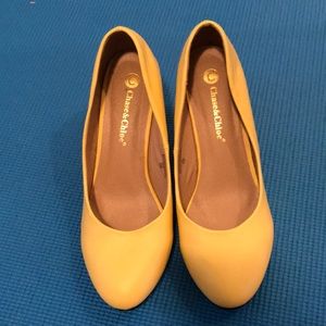 Size 10 Yellow pumps from ModCloth